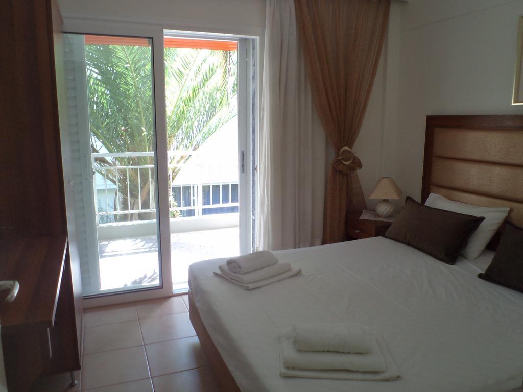 Maria Apartments Paralia Dionysiou Quarto foto